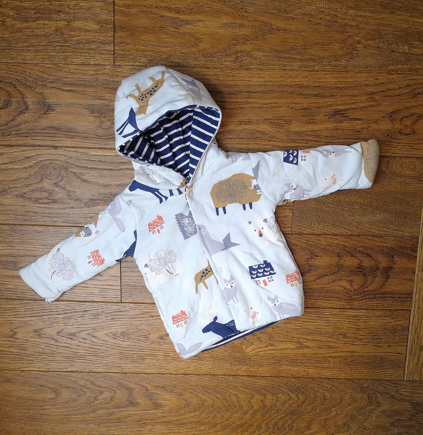 Marks and Spencer Animal Stripes Quilted Reversible Hooded Jacket 3-6 Months.