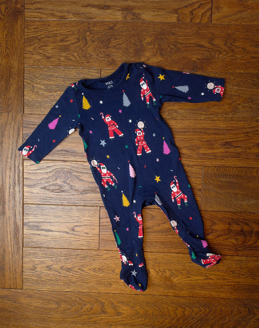 Marks and Spencer Christmas Disco Santa Sleepsuit 6-9 Months.